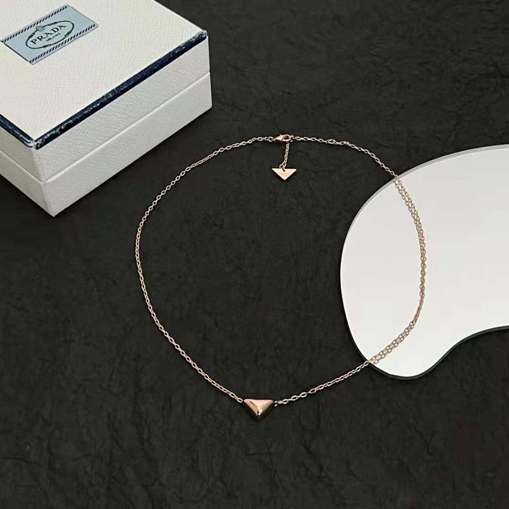Detail of lobster clasp and chain texture on Prada Women Eternal Gold Necklace
