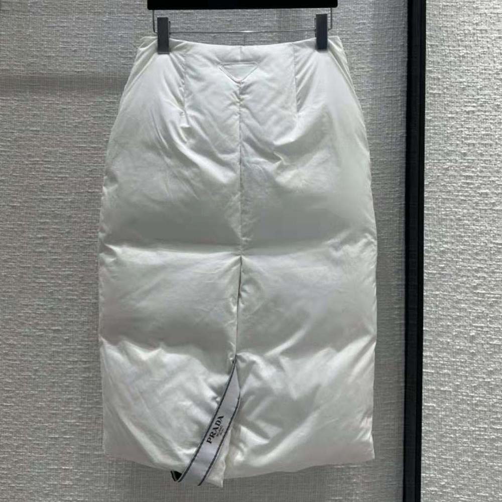 Side angle showing slim fit of Prada Women Padded Cotton Pencil Skirt