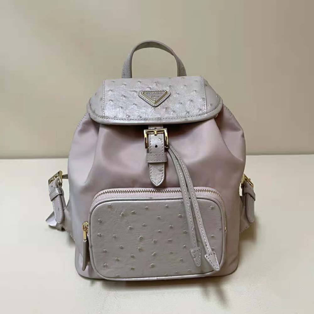 Close-up of pink ostrich leather detail on Prada backpack