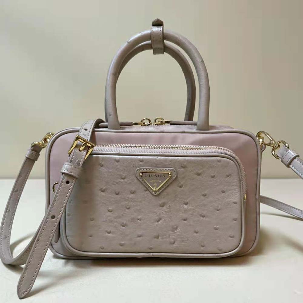 Close-up of ostrich leather detail on Prada Women Re-Nylon Two-handle Bag-Pink