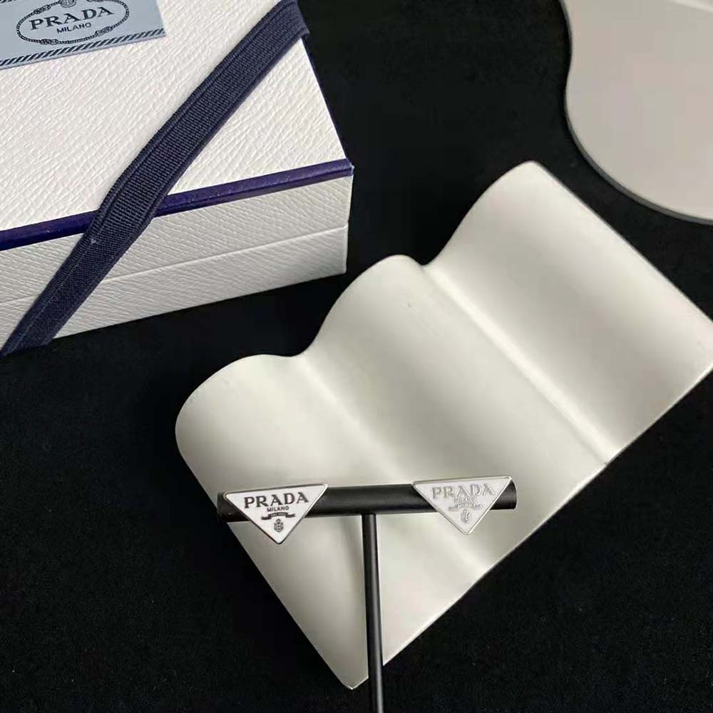 Side angle showing sleek profile of Prada Women Symbole Earrings
