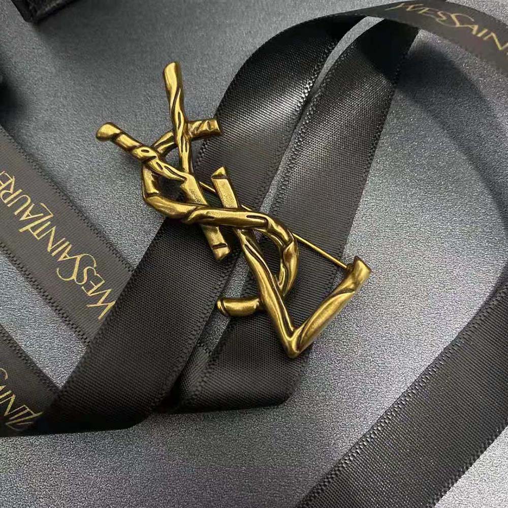 Side angle showcasing Saint Laurent YSL Women Opyum YSL Crocodile Brooch pin closure