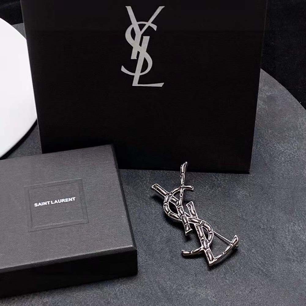 Side angle showing textured crocodile detail on Saint Laurent YSL Women Opyum YSL Crocodile Brooch