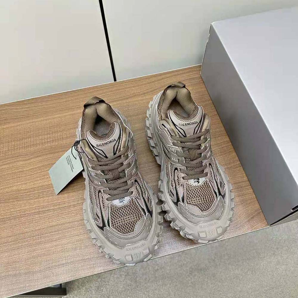Close-up of lace-up and signature detail on Balenciaga Unisex Bouncer Sneaker