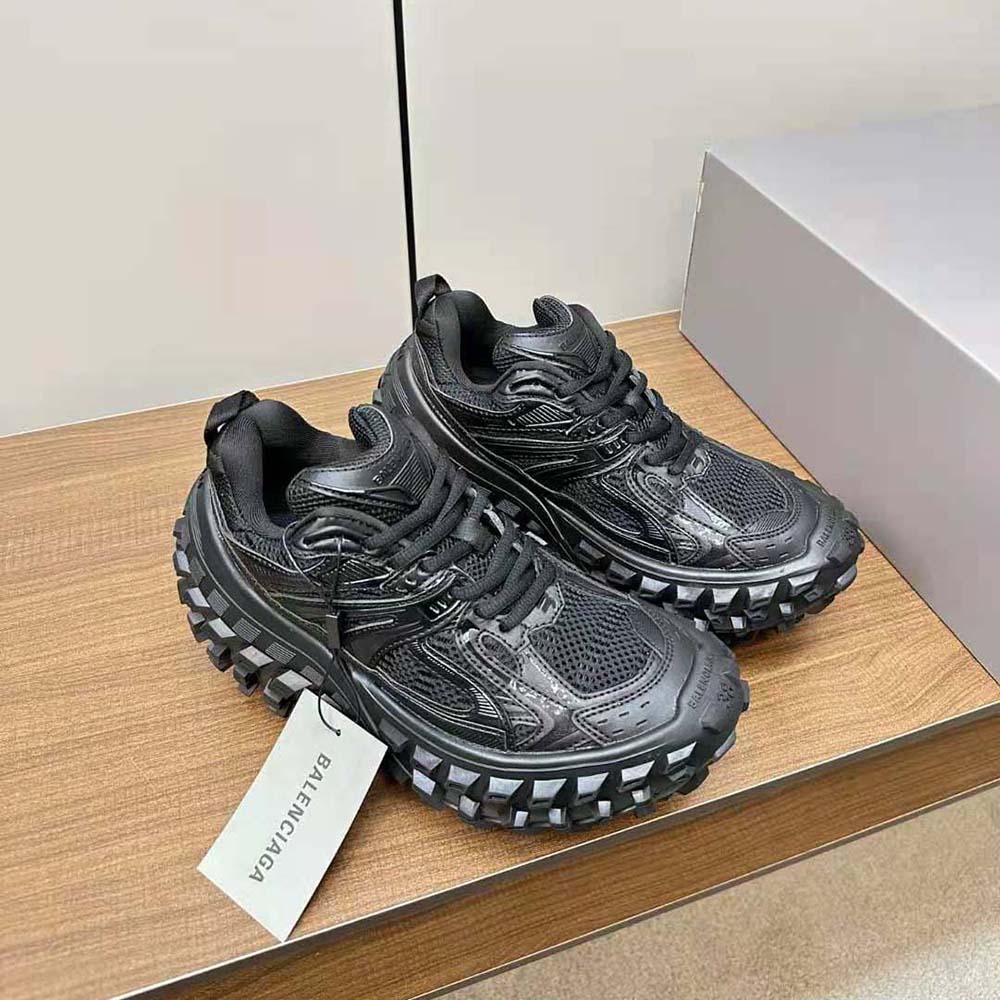 Top angle showcasing lace-up closure of Balenciaga Unisex Bouncer Sneaker black