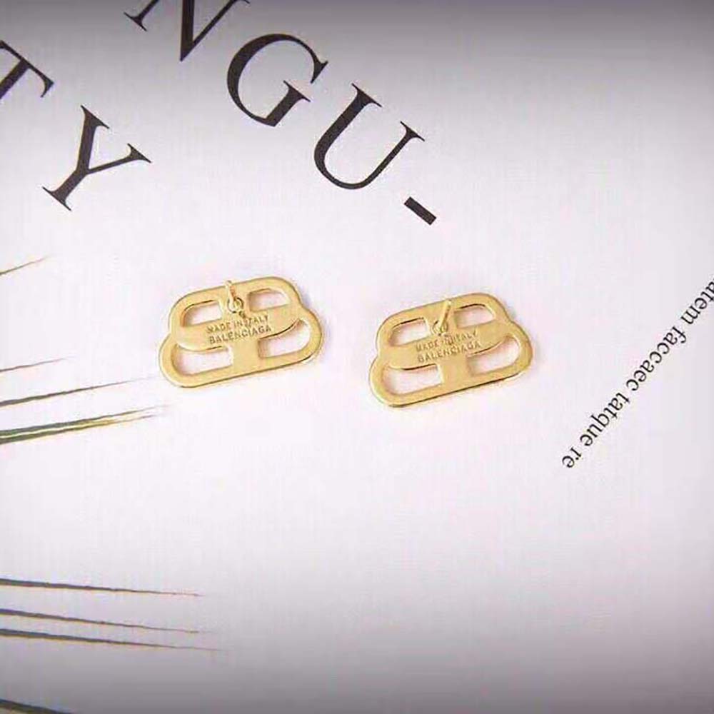 Close-up detail of Balenciaga Women BB S Stud Earrings logo embossing