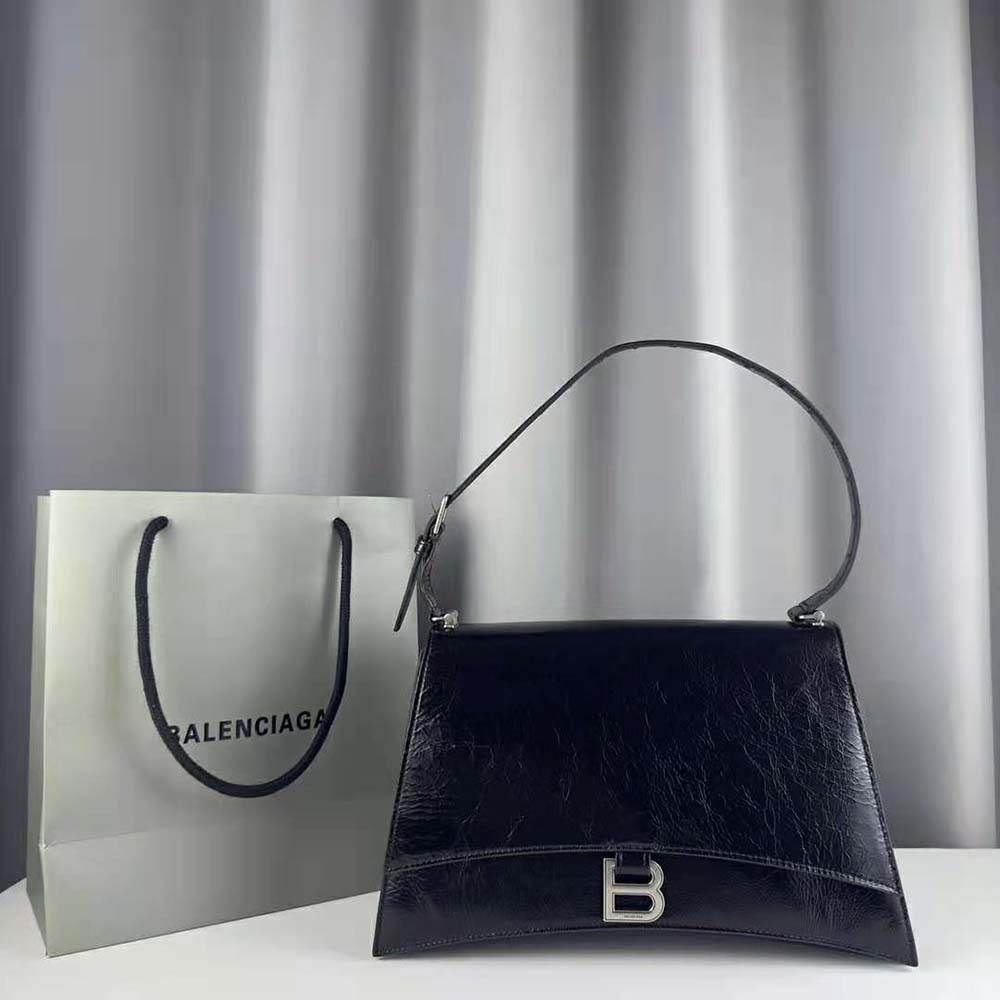 Close-up of gunmetal hardware on Balenciaga Women Crush Medium Sling Bag