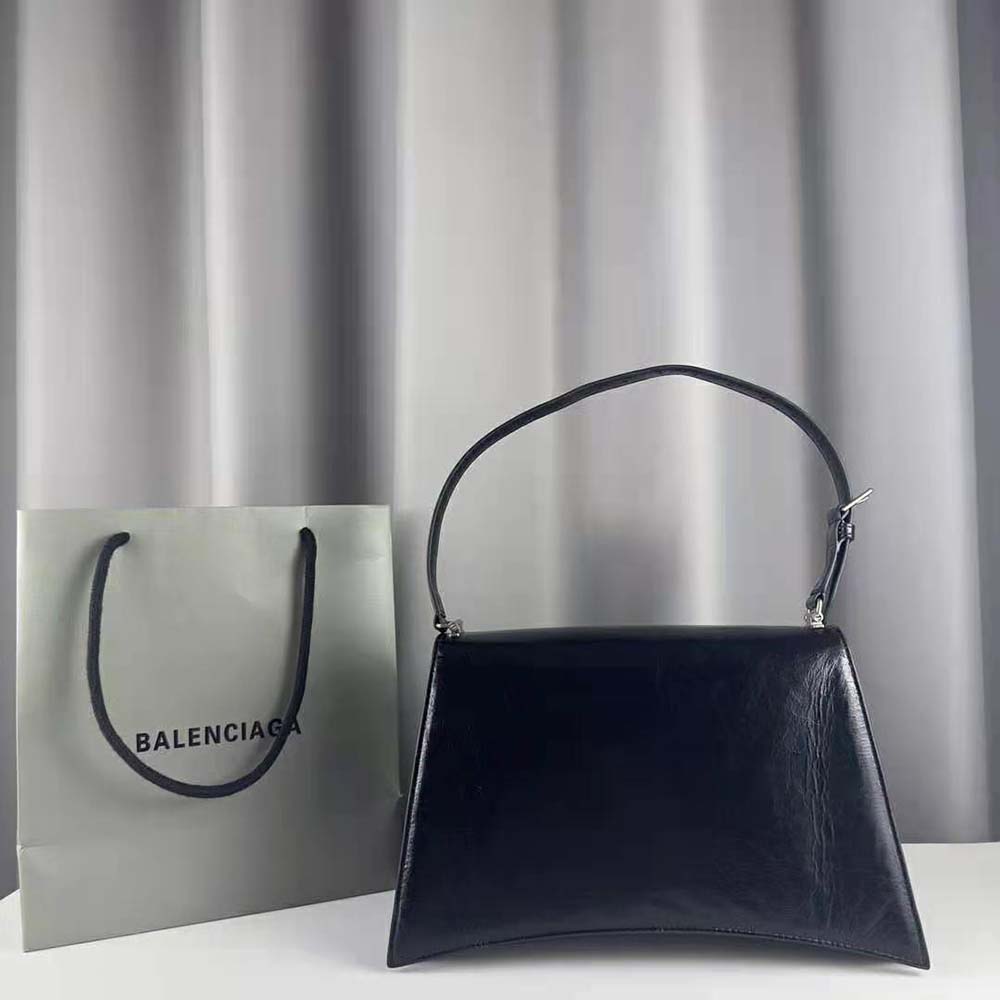 Side angle showing adjustable strap of Balenciaga Women Crush Medium Sling Bag