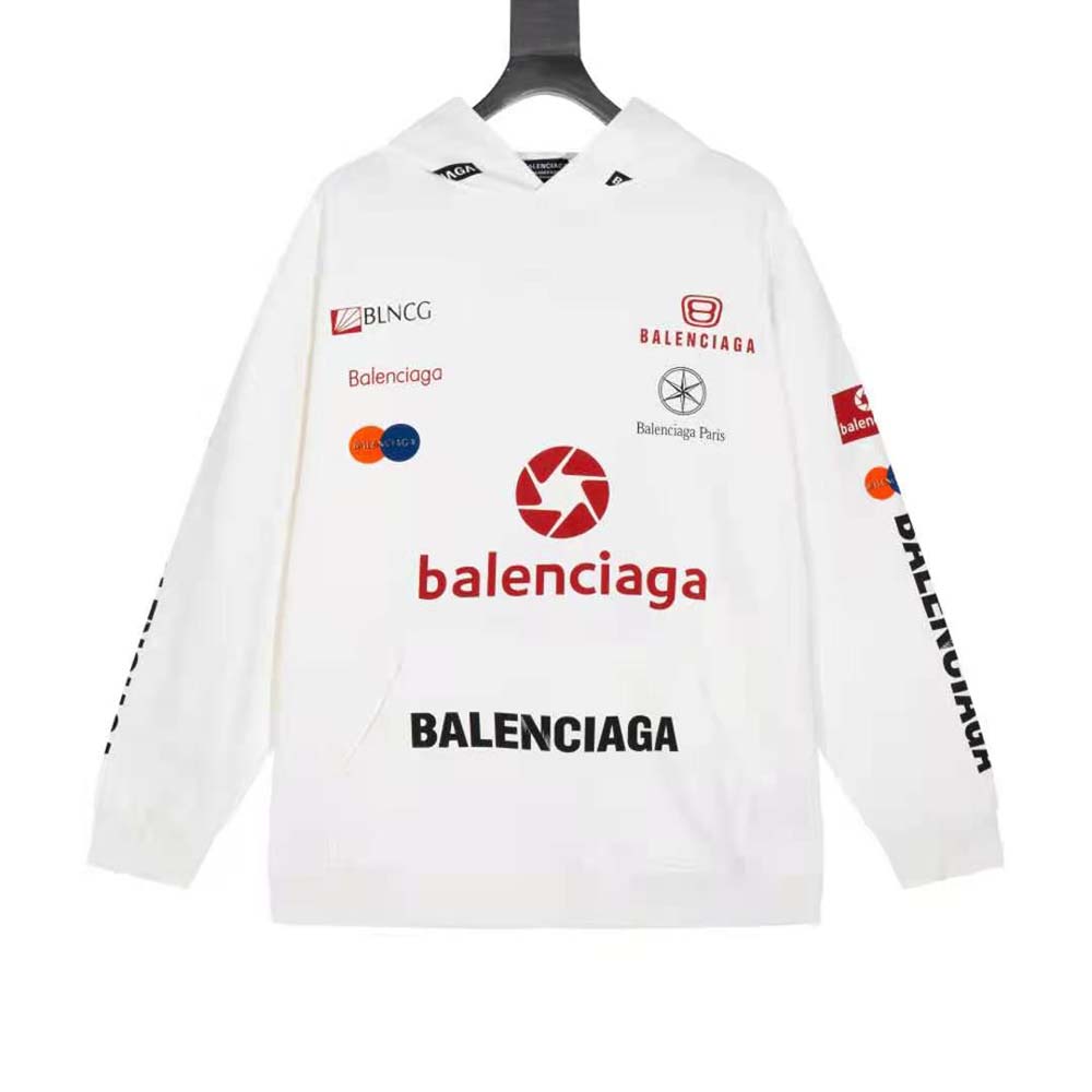 Close-up of embroidered logo on white Balenciaga oversized hoodie
