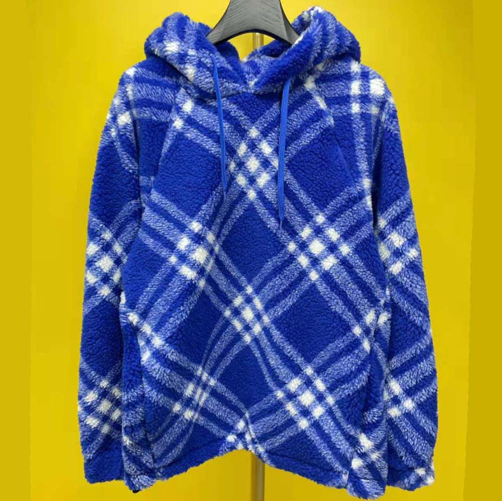 Side profile showcasing relaxed fit of Burberry Women Check Fleece Hoodie-Blue