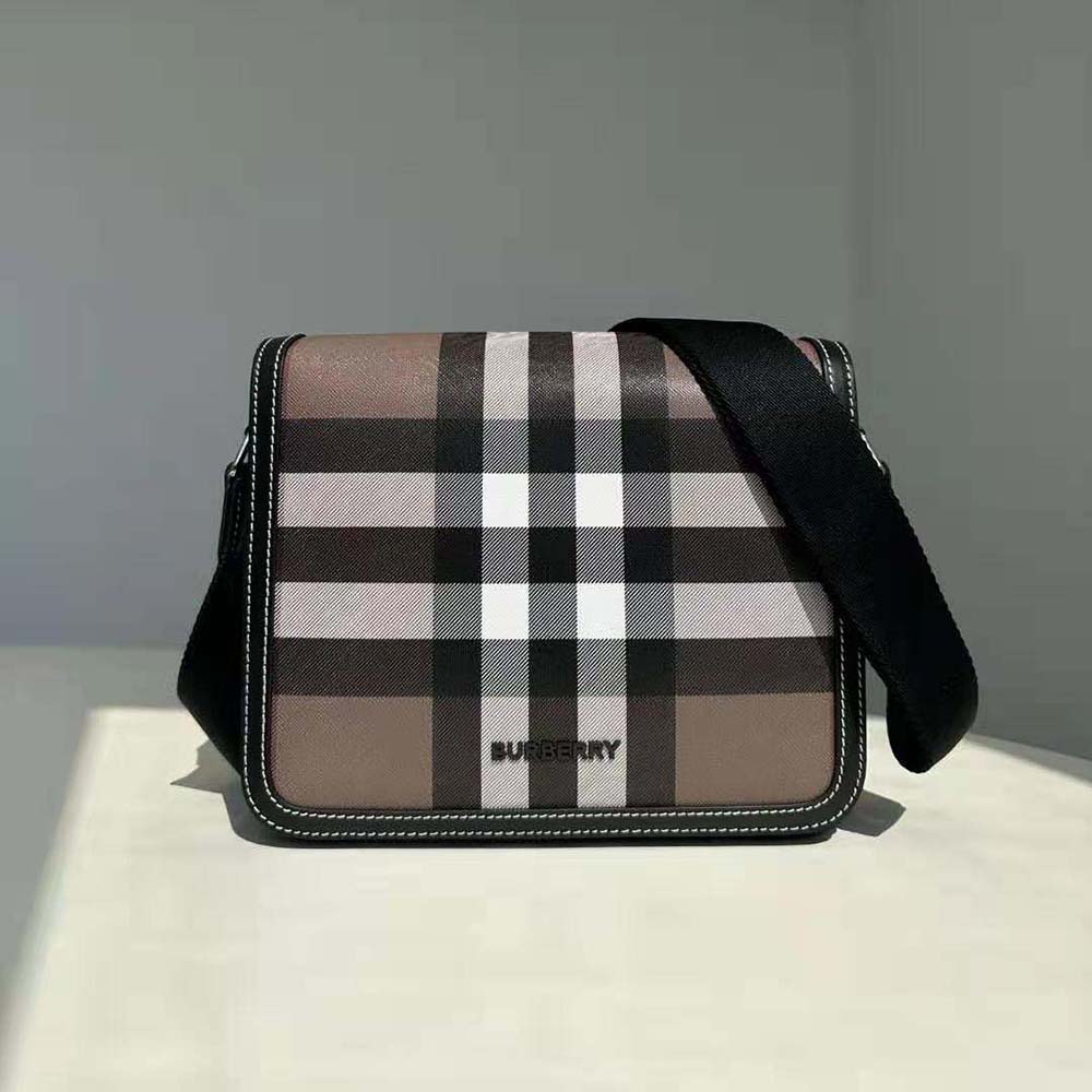 Side angle showing adjustable strap on Burberry Men Small Alfred Messenger Bag-Brown