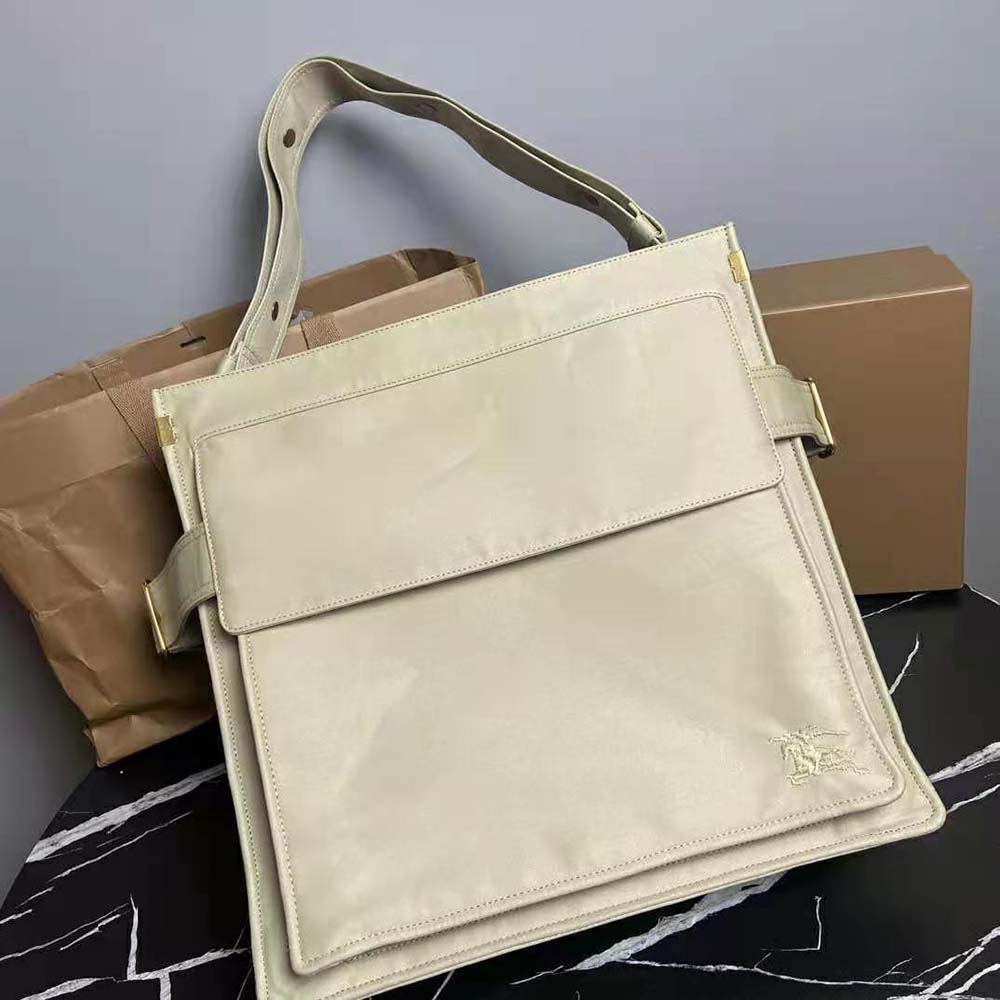 Side profile of Burberry Men Trench Tote-Green with adjustable strap visible