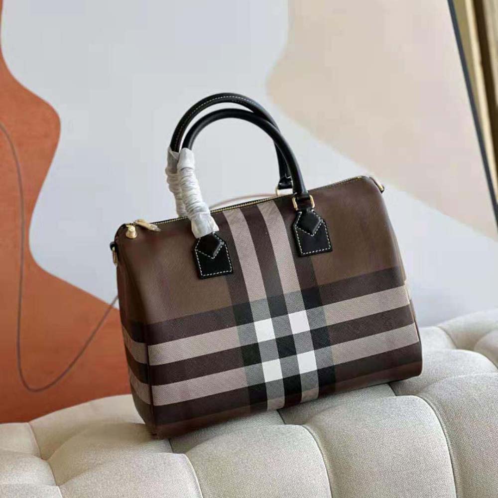 Close-up of Burberry Women Check Medium Bowling Bag-Black gunmetal hardware detail