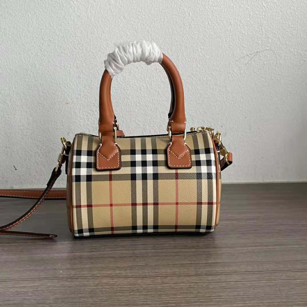 Side angle of Burberry Women Mini Check Bowling Bag-Brown highlighting silhouette and strap