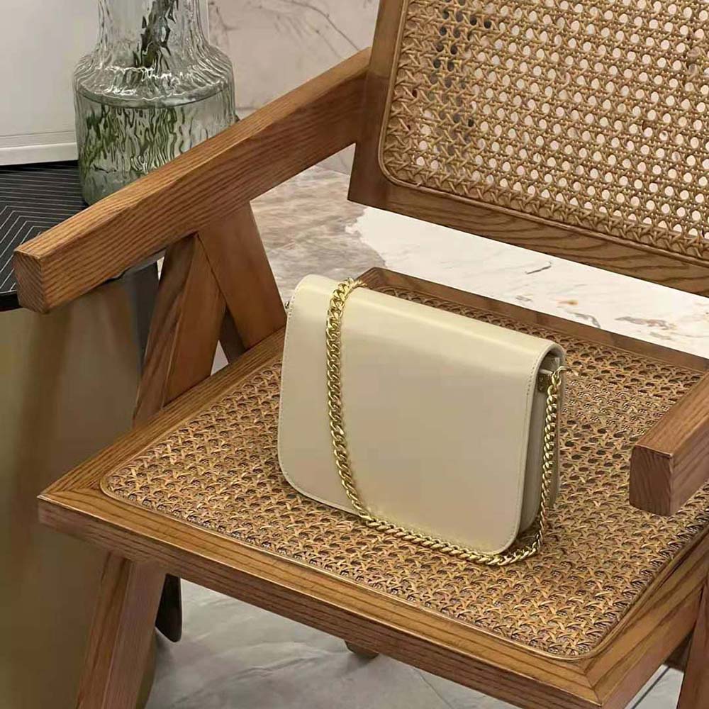 Side angle showing smooth beige calfskin texture on Celine Women Classique Triomphe Bag