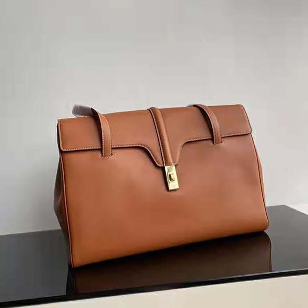 Close-up of smooth calfskin texture and gold hardware on Celine Soft 16 Bag