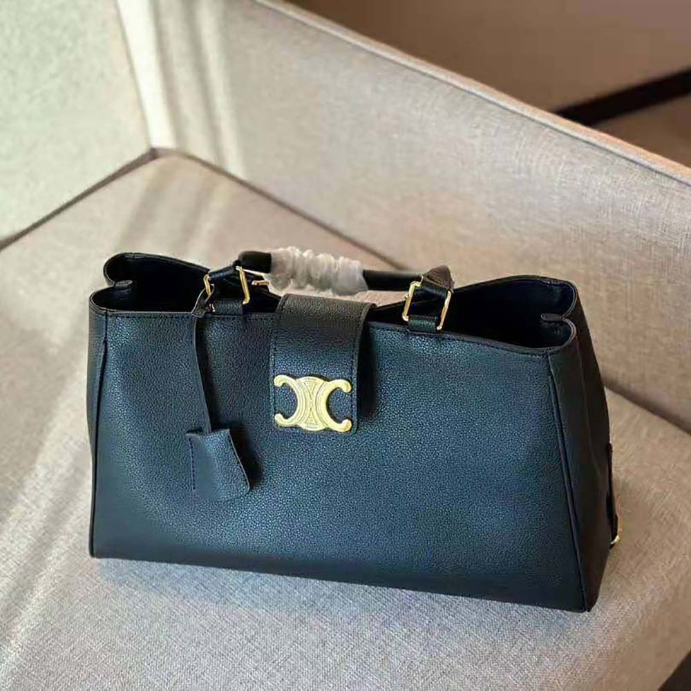 Side angle showing structured silhouette of Celine Appoline Black handbag