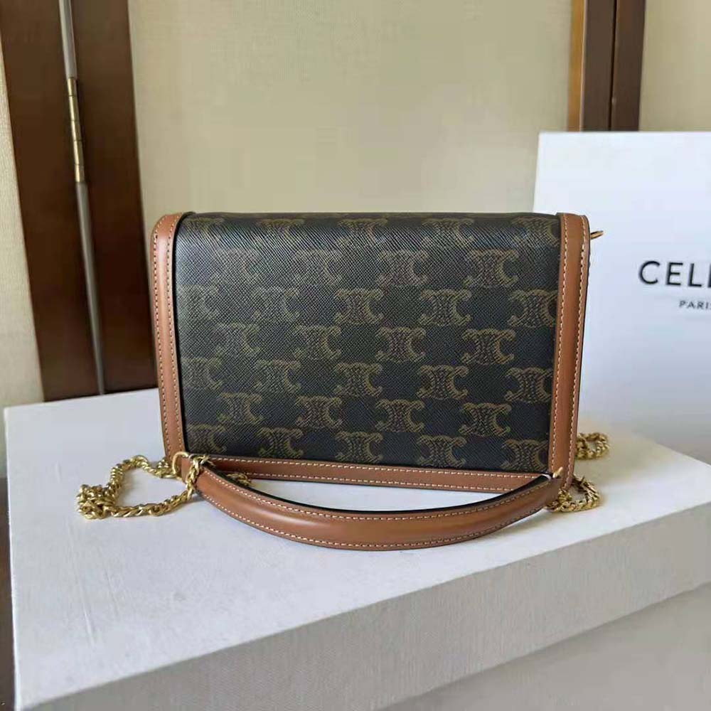 Side angle showing calfskin and chain strap of Celine Wallet on Chain Margo