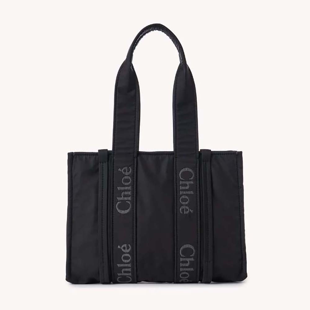 Front view of Chloe Women Medium Woody Tote Bag-Black showcasing leather texture