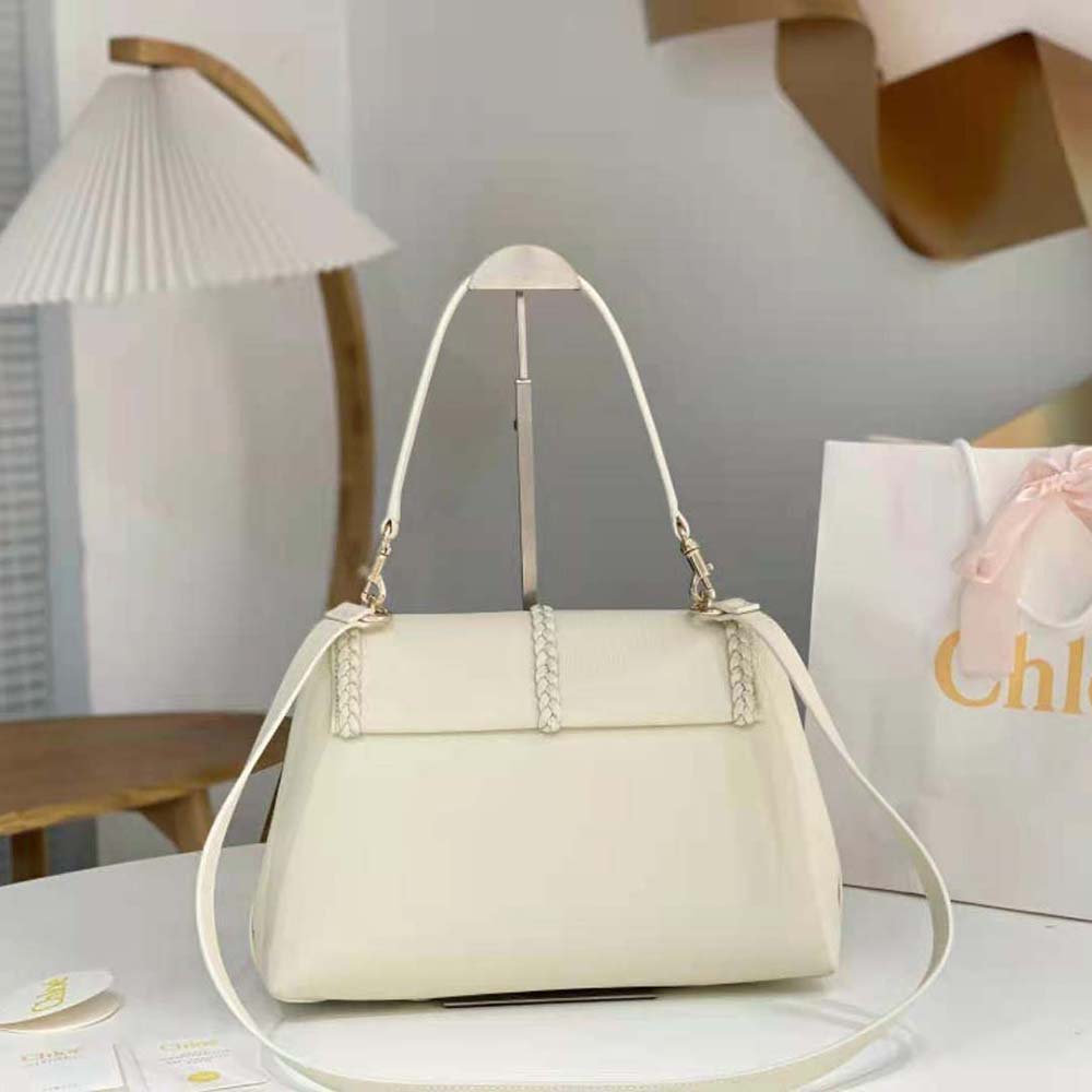 Side angle highlighting soft calfskin texture of Chloe Women Penelope Medium Soft Shoulder Bag-White