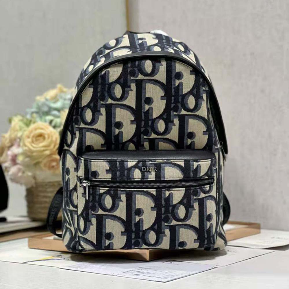 Close-up detail of signature jacquard fabric on Dior Men Rider Backpack