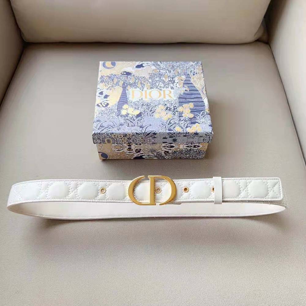 Close-up of white calfskin and signature cannage quilting on Dior belt
