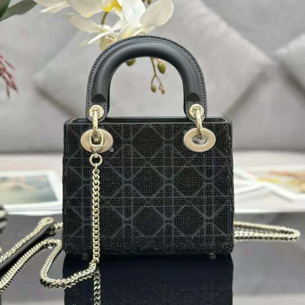 Side angle showing silver-tone hardware on Dior Women Mini Lady D-joy Bag