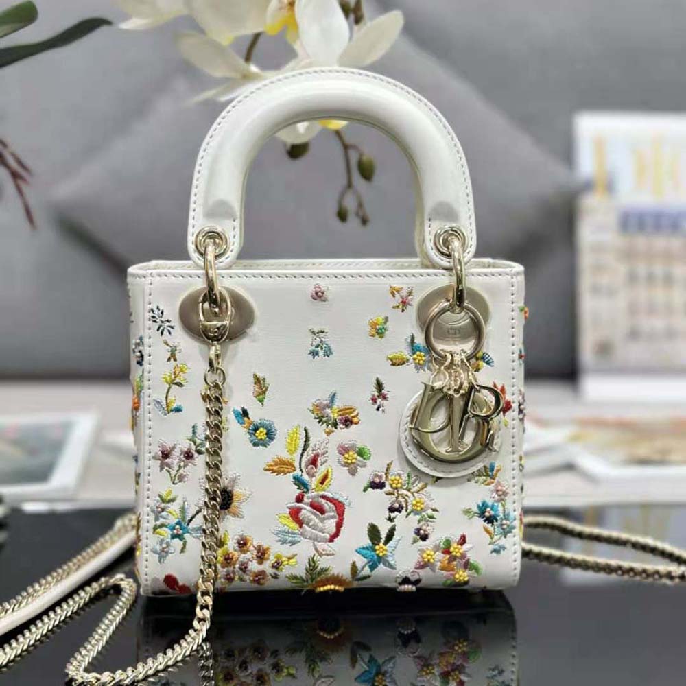 Close-up of multicolor floral embroidery on Dior Women Mini Lady Dior Bag