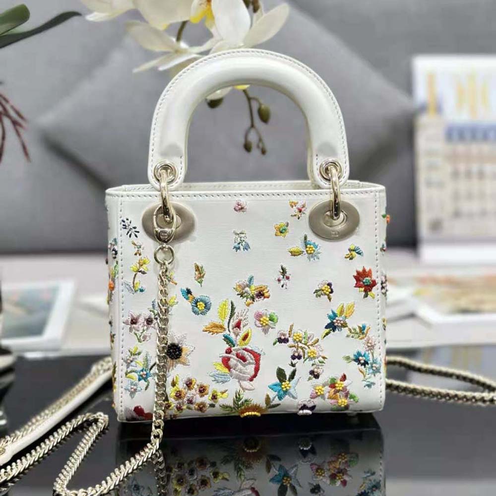 Side view showing silver-tone hardware on Dior Women Mini Lady Dior Bag