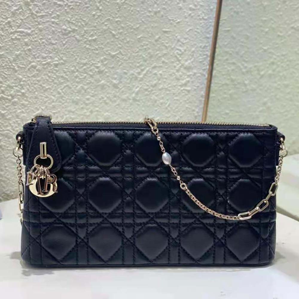 Side angle showing silver hardware on Dior Women Miss Dior Midi Mini Bag Black Cannage Lambskin