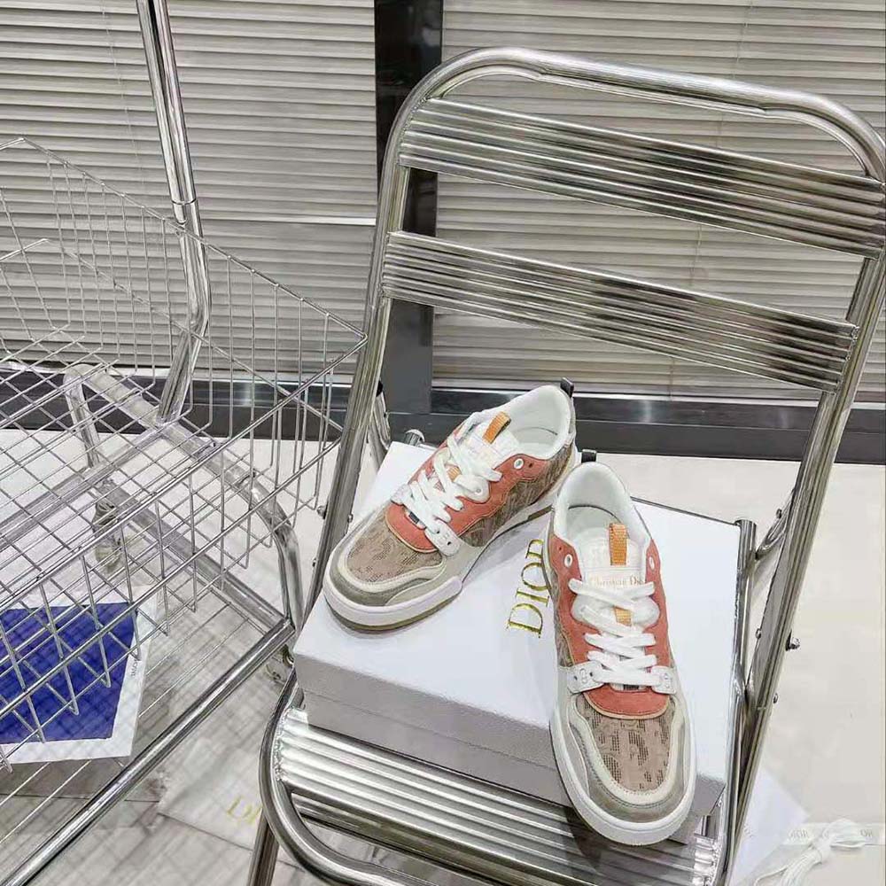 Top angle showing lace-up closure on Dior Women One Sneaker beige
