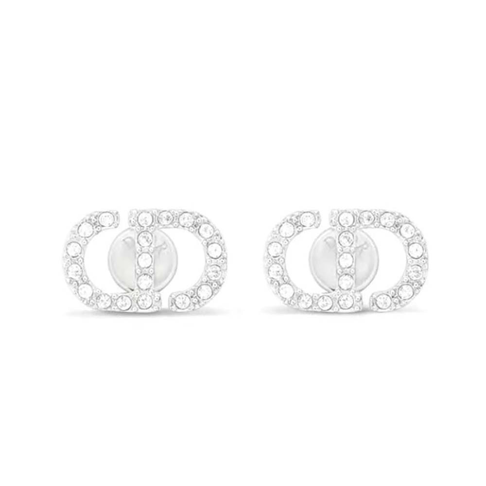 Close-up of white crystals on Dior Women Petit CD Mini Stud Earrings
