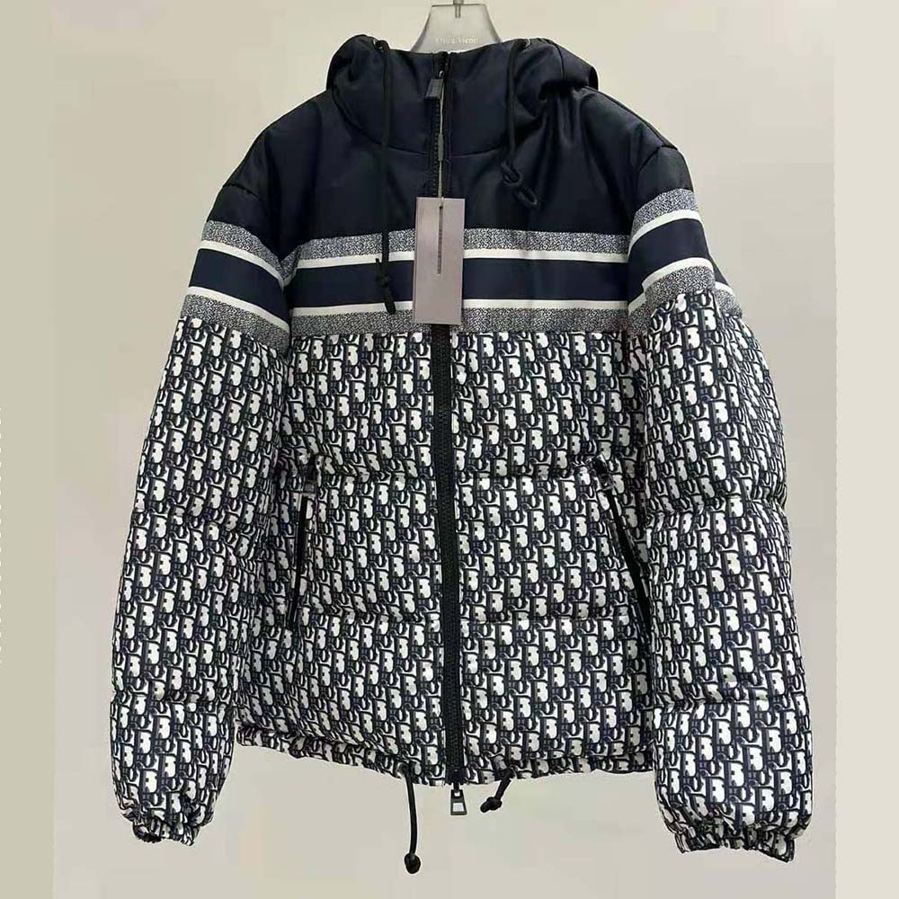 Side angle showing silhouette of Dior Men Reversible Long Puffer Jacket