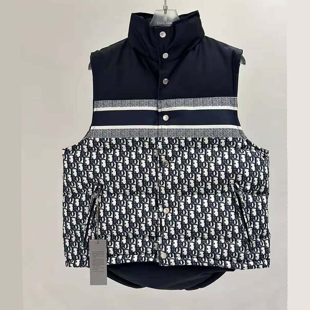 Close-up of Dior Oblique quilted pattern on reversible puffer vest