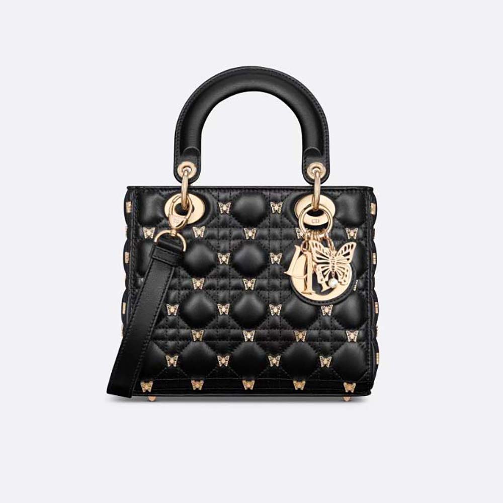 Front angle of Dior Women Small Lady Dior Bag Black Cannage Lambskin with Gold-Finish Butterfly Studs