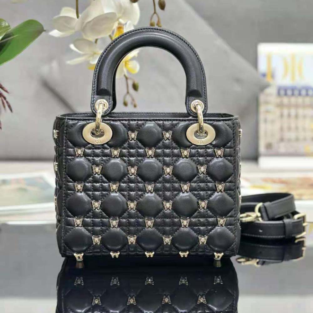 Side profile showcasing structured silhouette of Dior Women Small Lady Dior Bag Black Cannage Lambskin