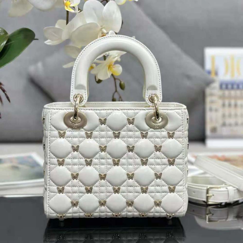 Side angle showing adjustable shoulder strap of Dior Women Small Lady Dior Bag