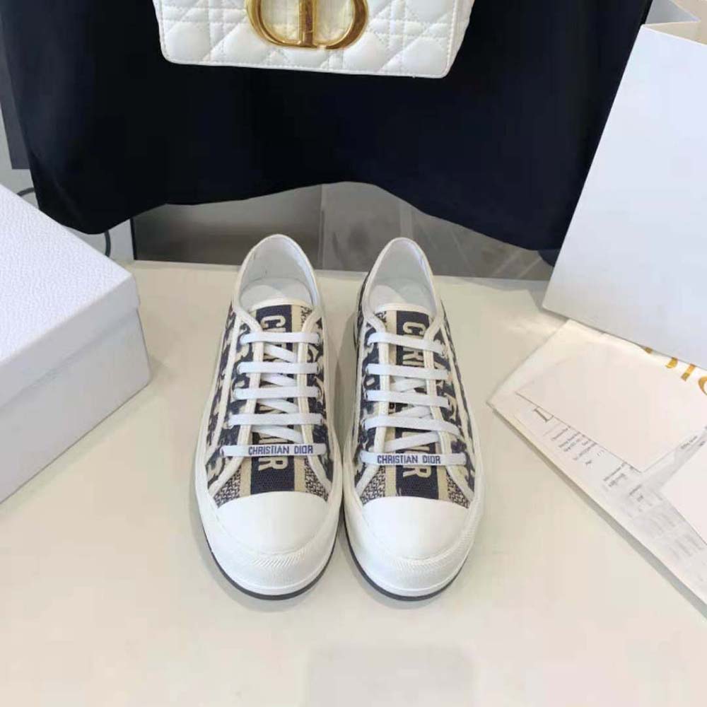 Close-up detail of Dior Oblique embroidery on sneaker’s cotton upper