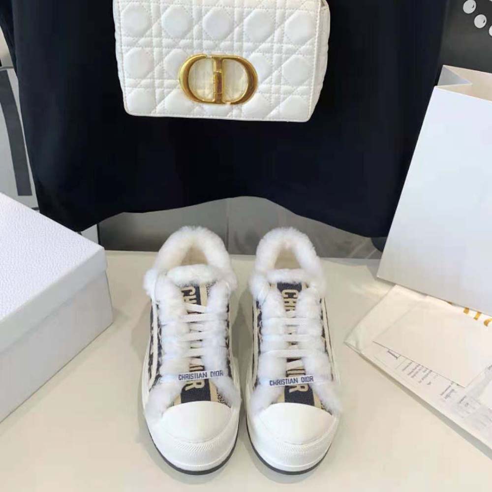 Close-up on white shearling lining and lace-up closure of Dior Women Walk’n’dior Platform Sneaker
