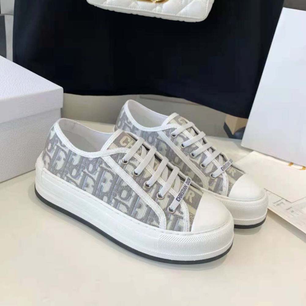 Overhead angle showing stone gray cotton and platform sole of Dior Women Walk’n’dior sneaker
