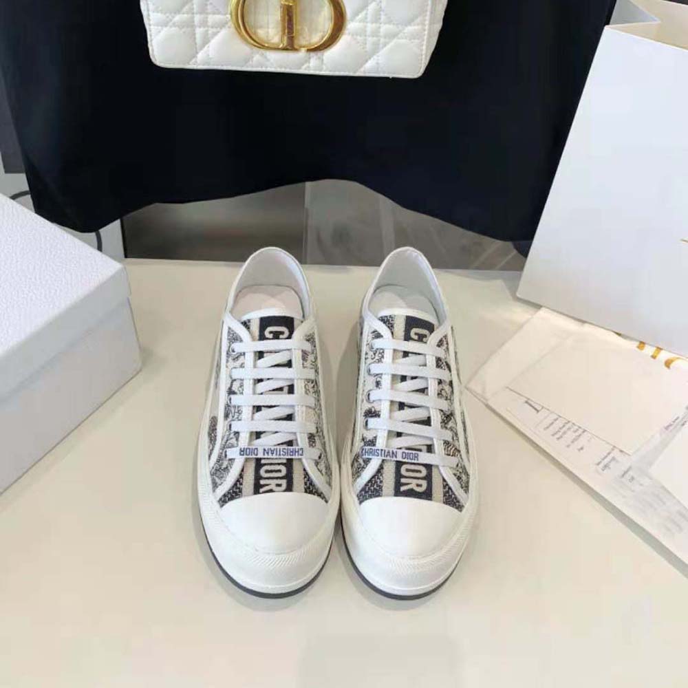Close-up of blue Toile de Jouy embroidery on Dior Women Walk’n’dior Platform Sneaker