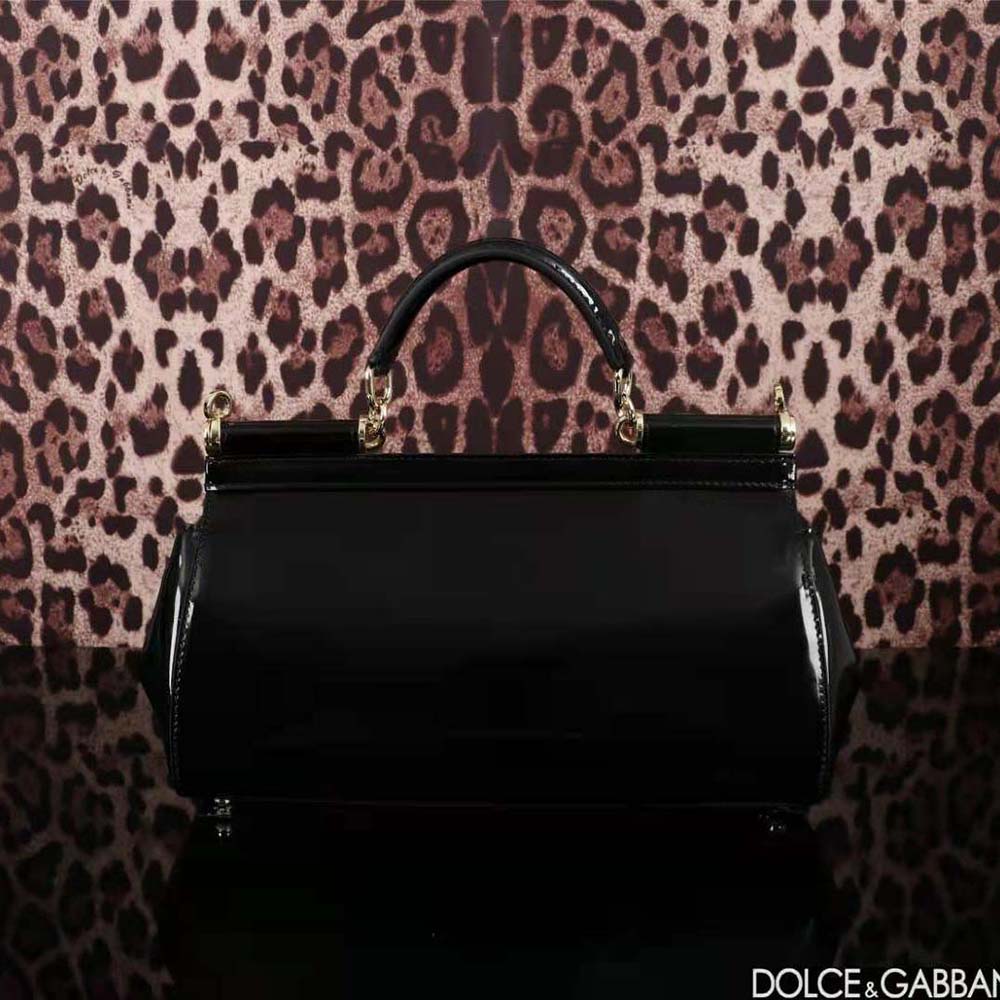 Side profile showing silhouette of Dolce Gabbana D&G elongated shoulder bag