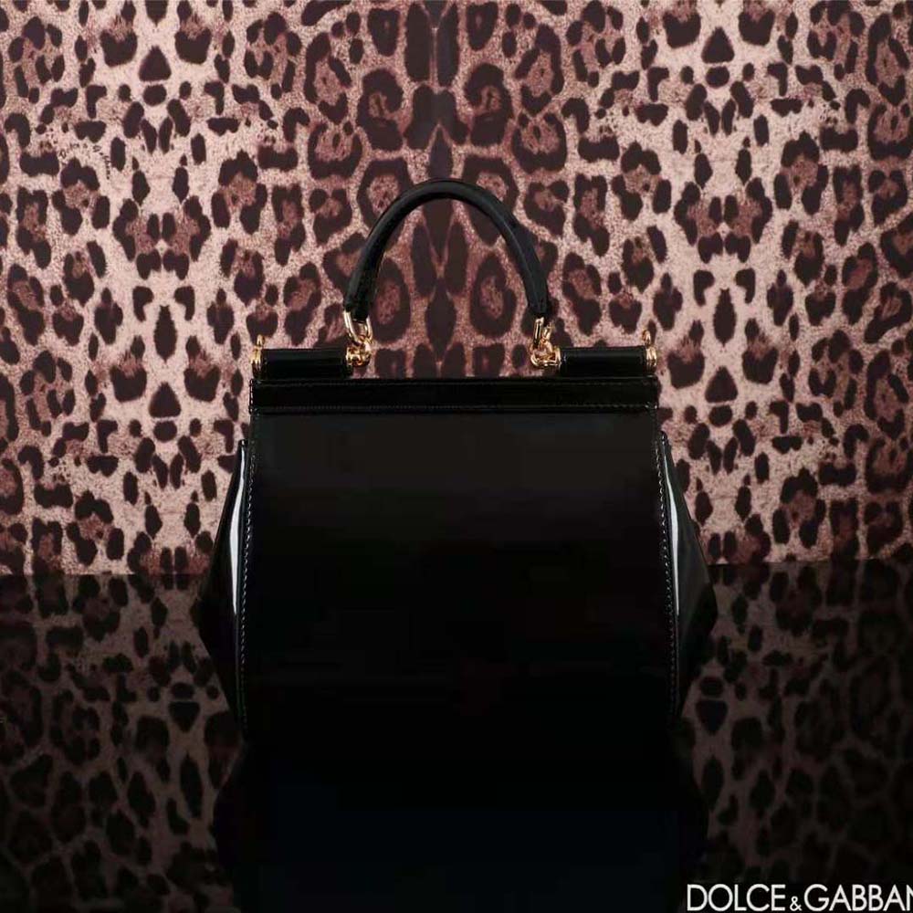 Side angle displaying structured silhouette of Dolce Gabbana D&G Women Medium Sicily Handbag-Black
