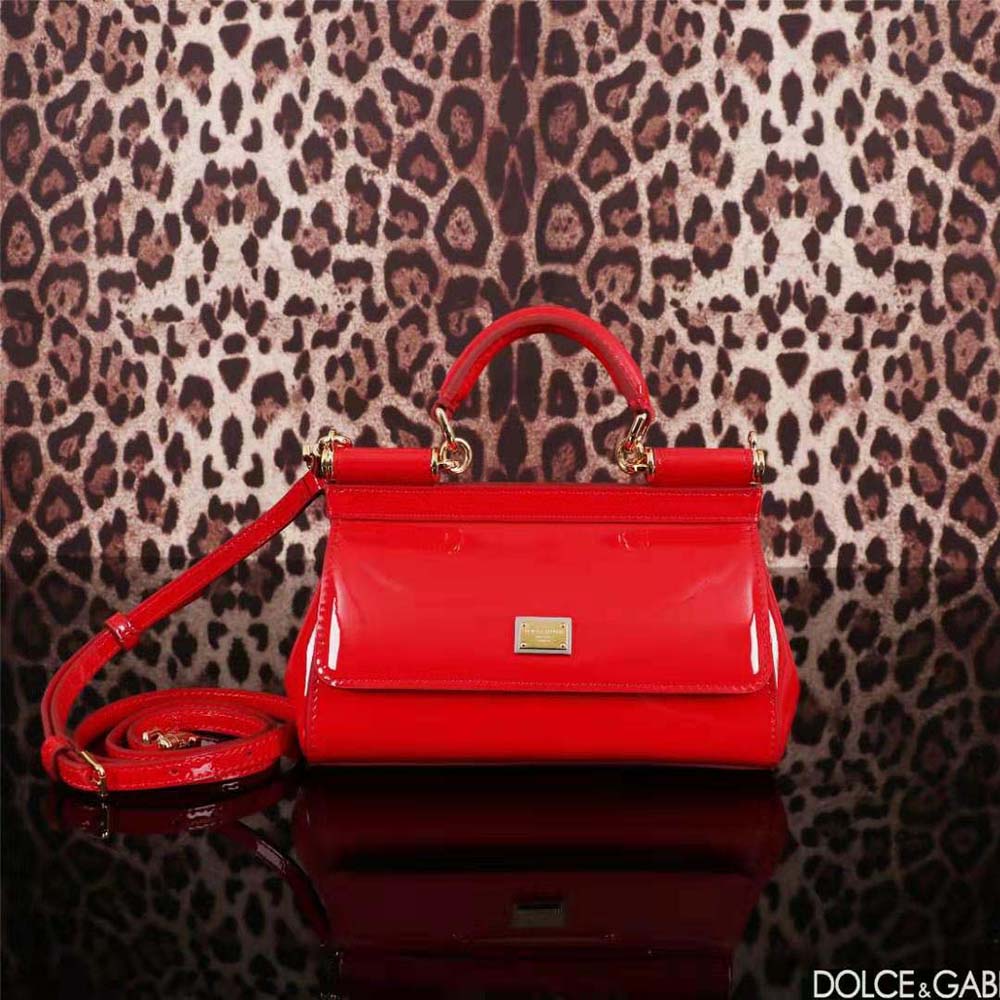 Side angle showing smooth leather and precise stitching on the Small Sicily Handbag