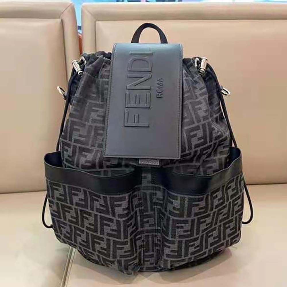 Close-up of gray jacquard fabric and gunmetal hardware on Fendi backpack