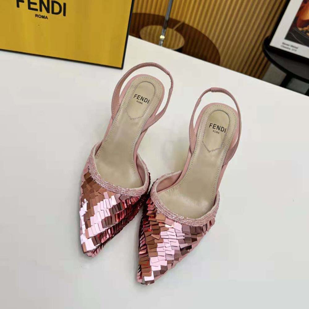 Close-up of pink sequins and gold Fendi hardware on slingbacks