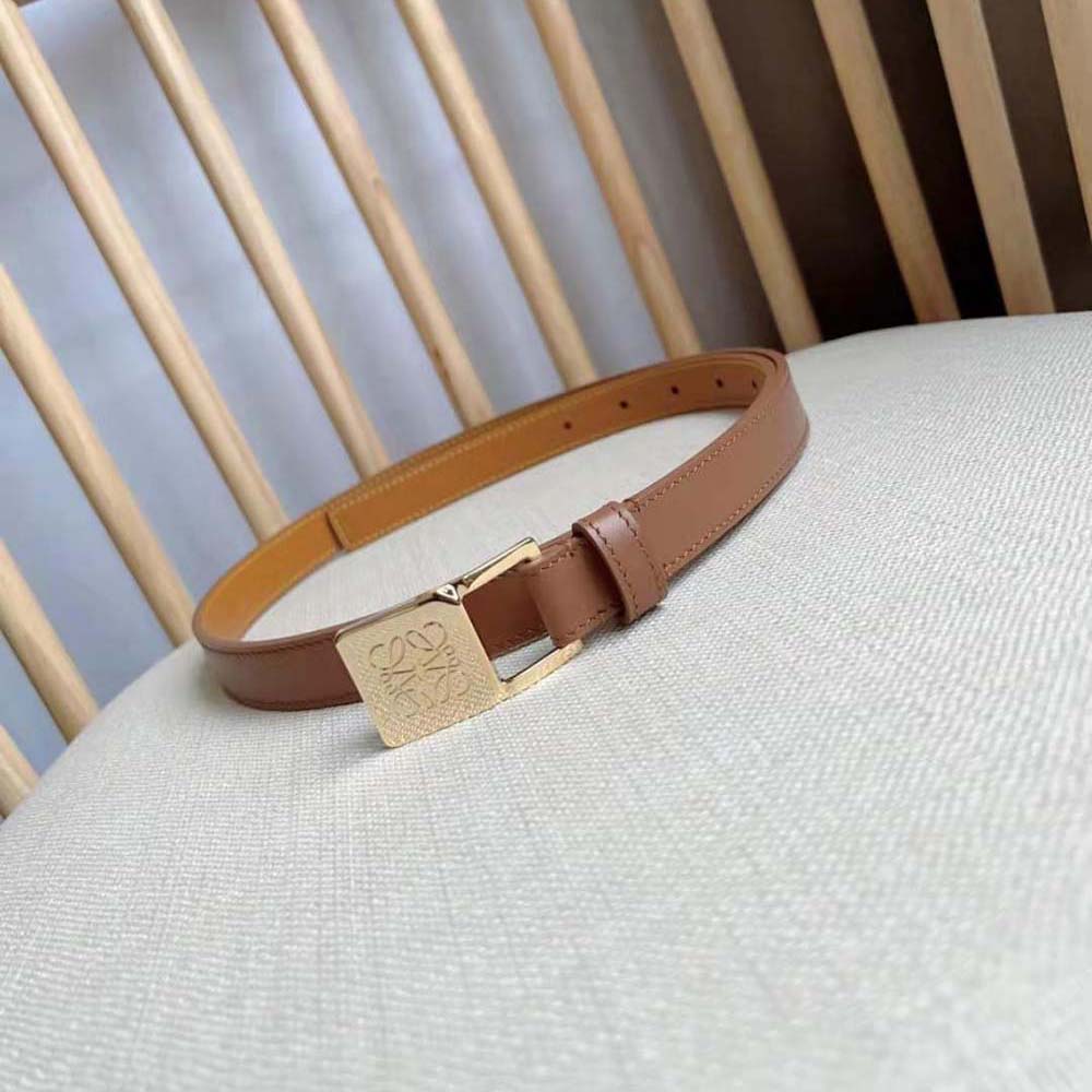 Side profile showing slim silhouette of Loewe Women Amazona Padlock Belt
