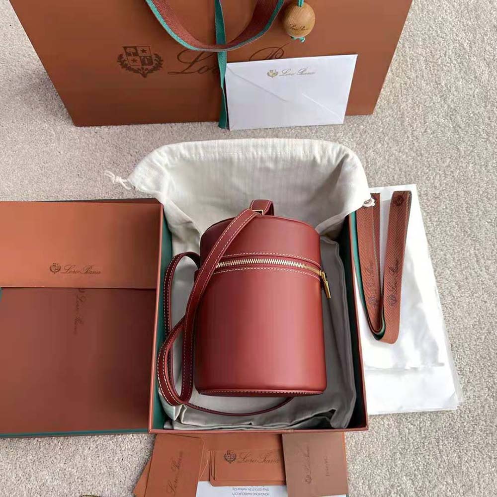 Side profile showing structured shape of Loro Piana Women Medium Extra Case