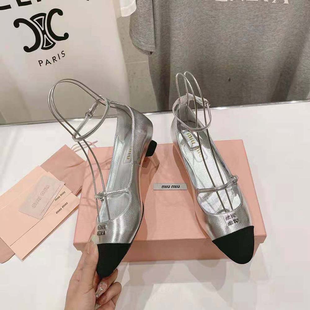 Top view showing silhouette and silver leather texture of Miu Miu Mordoré pumps