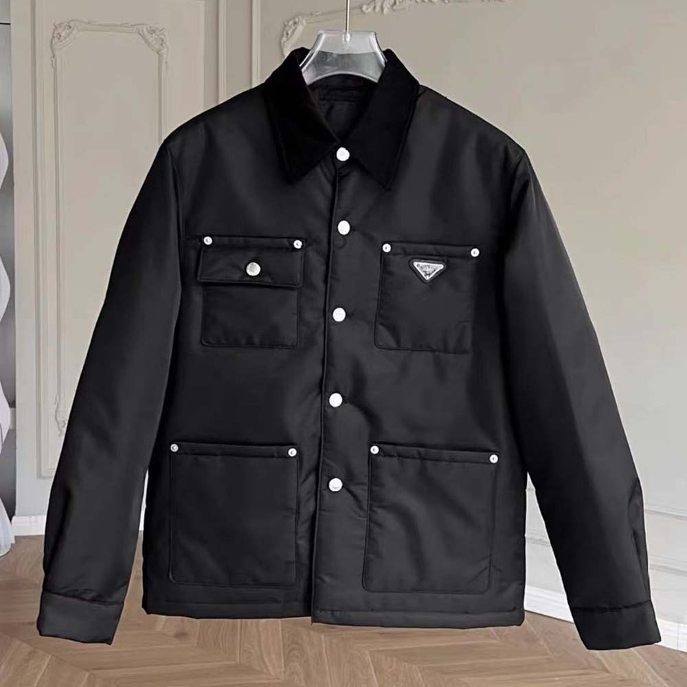 Close-up on black Re-Nylon fabric and silver hardware detailing